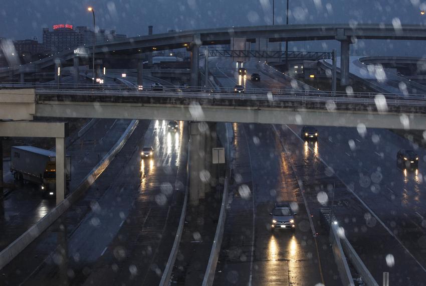 Cars drive down the highways after winter weather went through Dallas on Feb. 2, 2023.