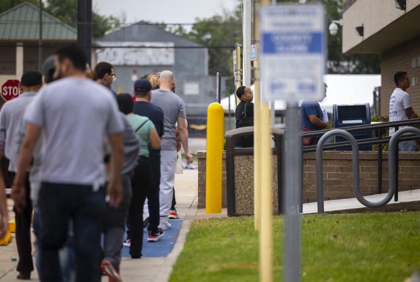 Dozens of people enter the Harris County Justice of the Peace (Pct. 5, Place 1) after waiting outside for it to open on Tuesday, April 4, 2023, in Houston, TX.     