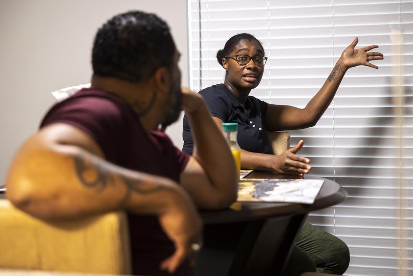 Tenants Anthony McDonald, left, and his wife Stalica Munroe discuss their eviction in their apartment at the Life at Jackson Square apartments on Tuesday, April 11, 2023, in Houston, TX. McDonald and Munroe were seemingly accidentally evicted after agreeing with the complex to pay at the end of the month.