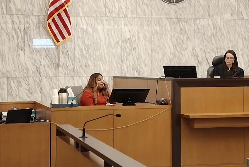Samantha Casiano wipes away tears as she gives testimony in a Travis County Courtroom on Wednesday, July 19, 2023.