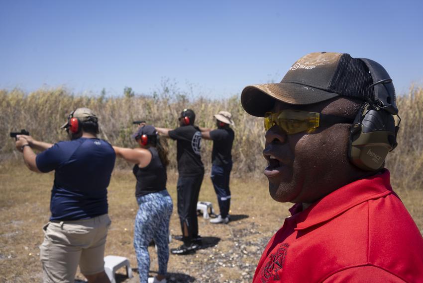Michael Cargill, owner of Central Texas Gun Works, yells instructions to a group of people during a license-to-carry class at the Lone Star Gun Range in Lockhart on Aug. 5, 2023.