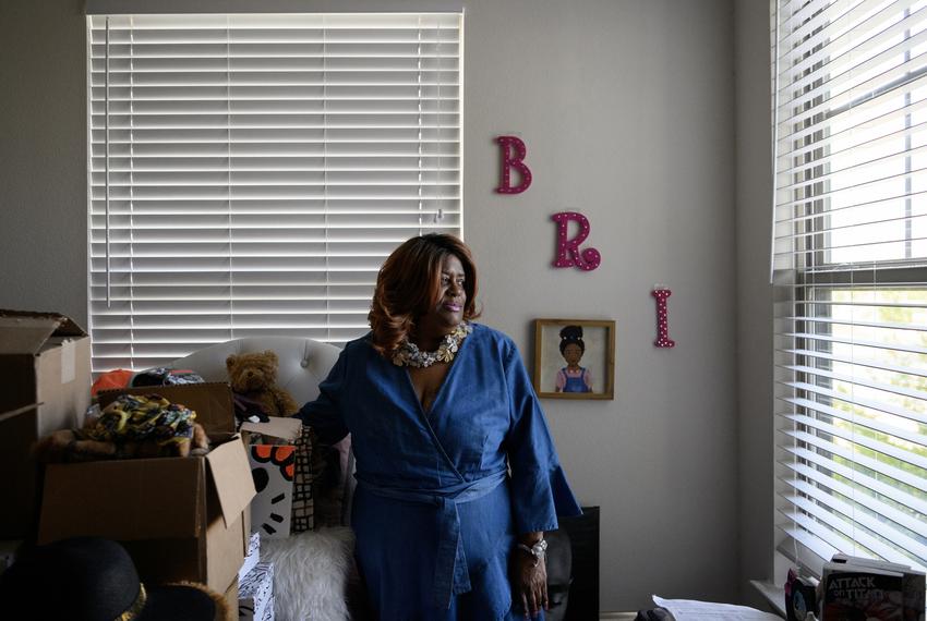 Sherri Johnson, the mother and biological grandmother of Bri'Jean Swain, a 17-year-old who was shot and killed in April, poses for a portrait in Bri’Jean’s bedroom in Houston, Texas, U.S., on Monday, August 14, 2023. In 2022, young people, defined as those younger than 25, accounted for 26 percent of firearm deaths across the state.