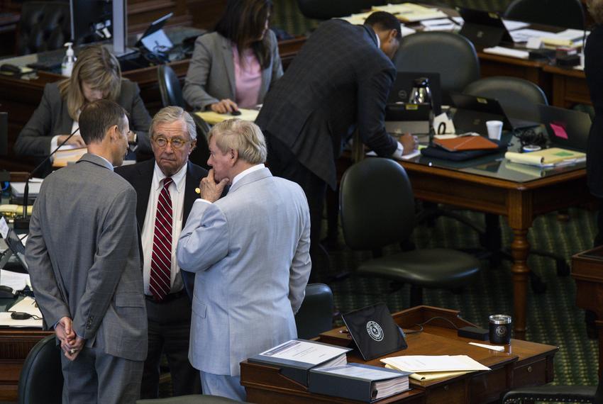 From left, House Impeachment Manager Andrew Murr, R-Junction speaks with prosecution lawyers Dick DeGuerin and Rusty Hardin during a short recess on the second day of the impeachment trial for suspended Attorney General Ken Paxton Wednesday, Sept. 6, 2023 in Austin.