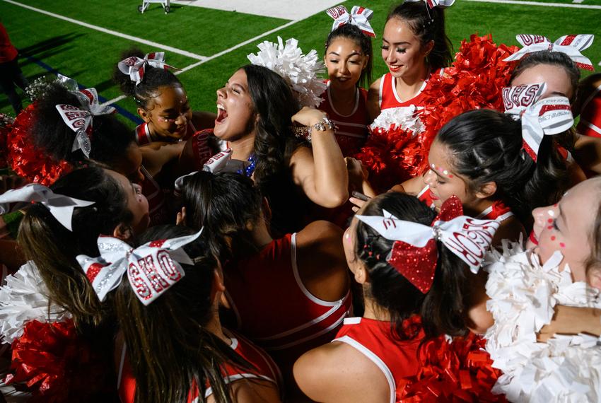 Odessa High School senior Kazandra Hinojos, 17, celebrates with her cheerleading squad after being named Homecoming Queen during the high school football game between OHS and Amarillo High School Friday, Sept. 15, 2023 in Odessa.
