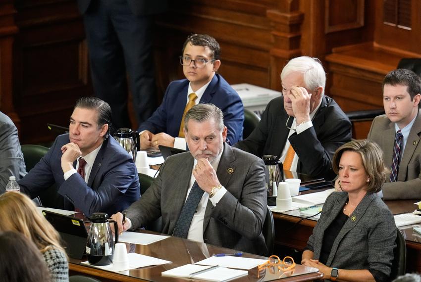 House impeachment manager Rep. David Spiller, R-Jacksboro, center, listens as votes are votes cast during Attorney General Ken Paxton's impeachment trial on Sept. 16, 2023.