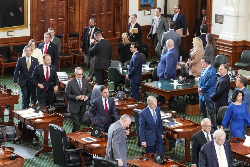 State senators file into the Texas Senate to cast their votes on the articles of impeachment on Sept. 16, 2023.