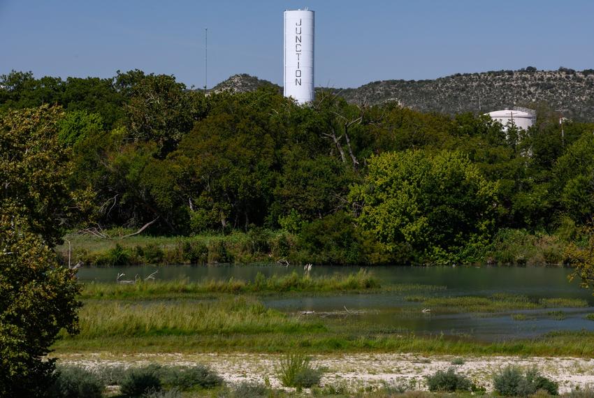 A water tower is seen beyond a section of the South Llano river Wednesday, Sept. 20, 2023, in Junction.
