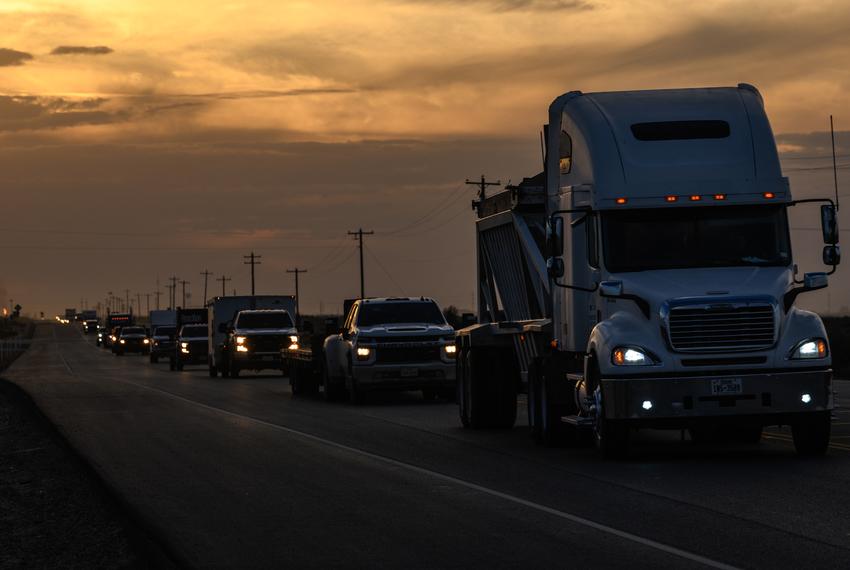 Oilfield traffic travels east along State Highway 302 out of Kermit, Wednesday, Nov. 8, 2023 in Winkler County.