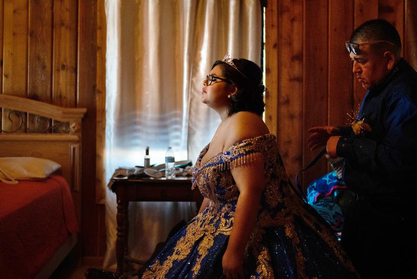 Yaneli Ortiz closes her eyes as her father helps her get ready  before her quinceañera in Laredo Texas.  In 2019 Yaneli was diagnosed with acute lymphocytic leukemia, a cancer that’s been linked to ethylene oxide exposure. Her legs and hip are in almost constant pain. Her hip bone had begun to die due to steroids that had diminished the blood supply through her leg and joints. Up to half of children treated for acute lymphocytic leukemia develop some degree of this condition, called avascular necrosis.