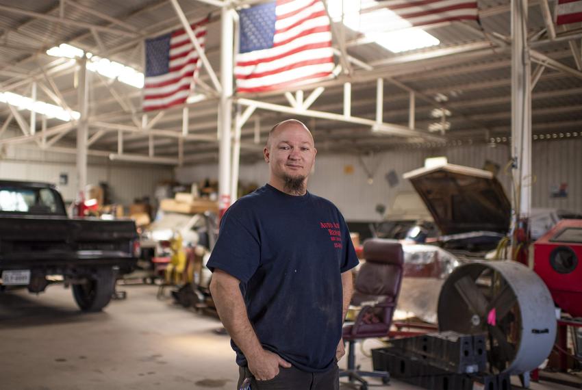 James Sargent stands inside Auto Aide Repair in Abilene, Texas on Thursday, April 27, 2023. (Photo by Emil T. Lippe for Pro Publica)