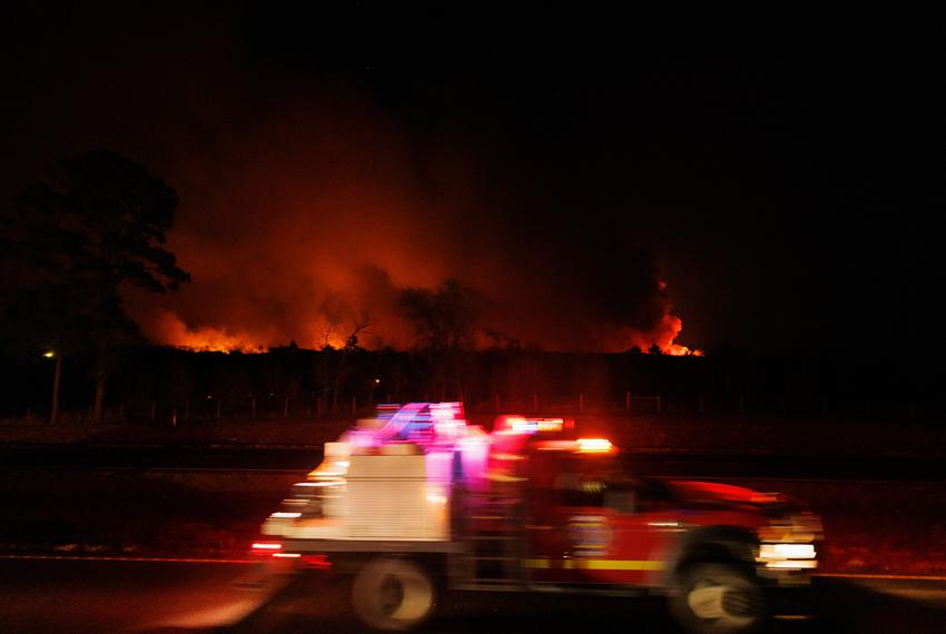 The Rolling Pines Fire blazes through Bastrop State Park on Jan. 18, 2022.