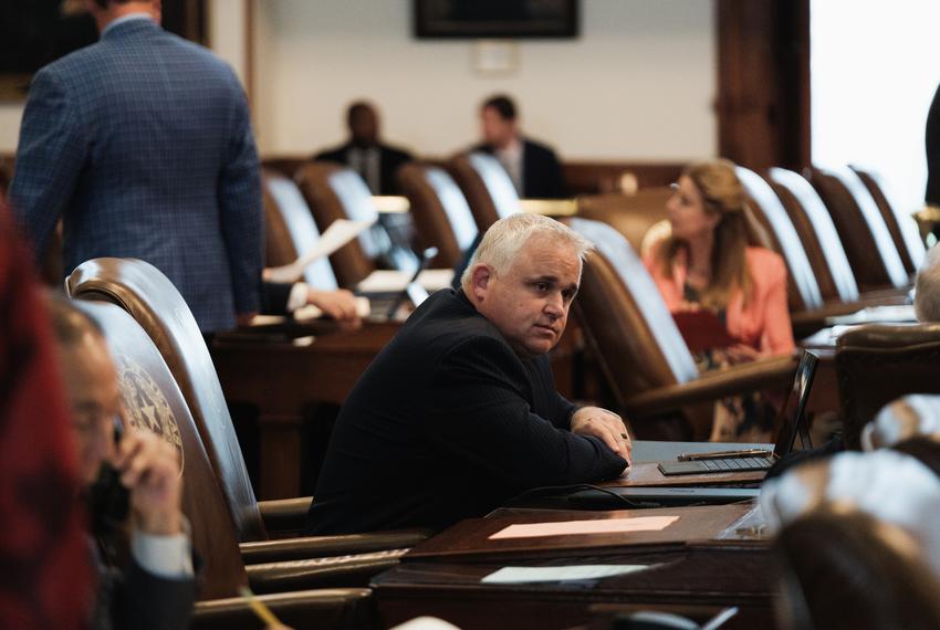 State Rep. Bryan Slaton, R-Royse City, sits at his desk on the House floor in Austin on April 18, 2023.