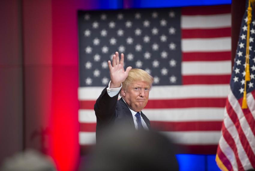 Donald Trump rallies a crowd of veterans at Drake University on Jan. 28, 2016, while other Republican presidential candidates hold a final Des Moines debate prior to the Iowa caucuses.