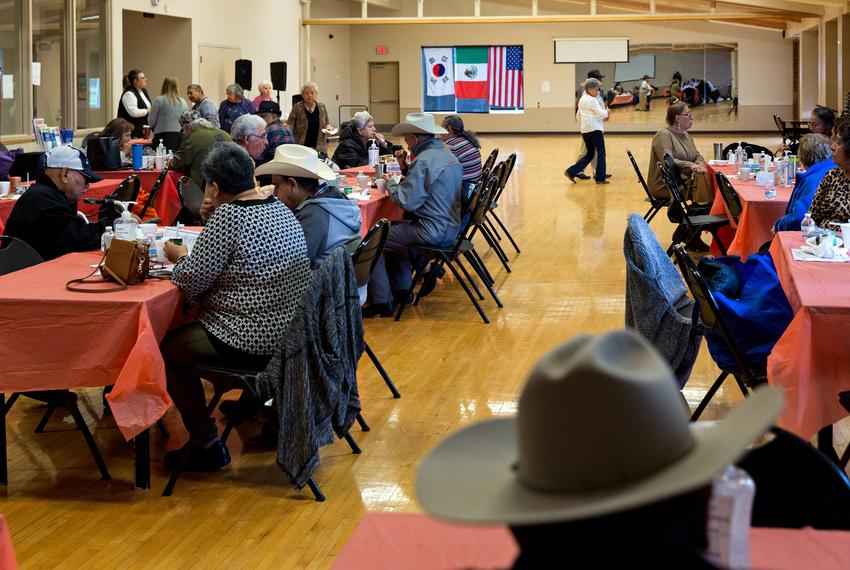 Seniors gather to eat and dance at the Ledbetter Eagle Ford Community Organization’s senior program held at the Jaycee-Zaragoza Recreation Center located in West Dallas on Nov. 4, 2021.