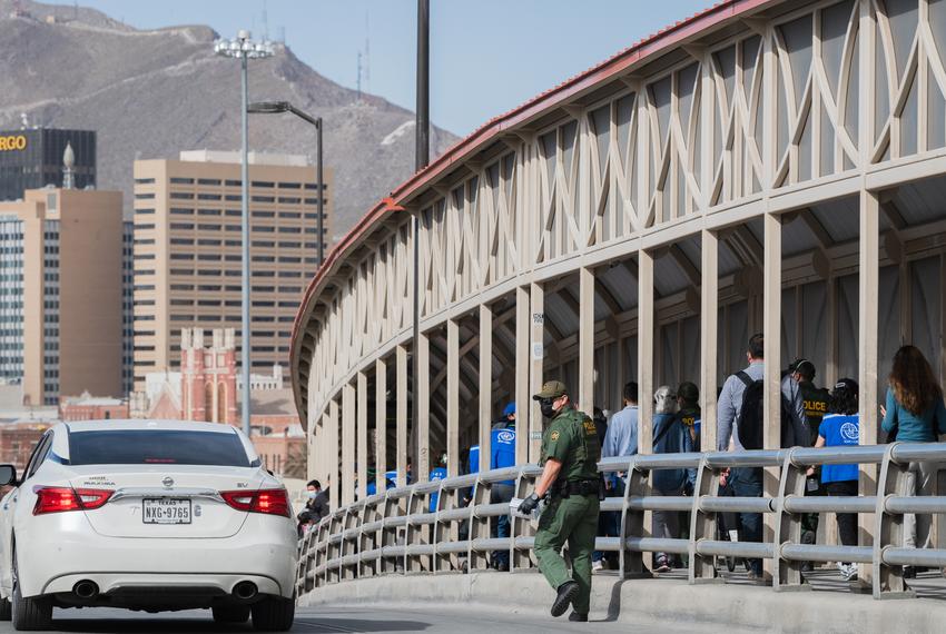 Asylum seekers in MPP cross the Paso del Norte International Bridge from Ciudad Juárez to El Paso on Feb. 26, 2021.