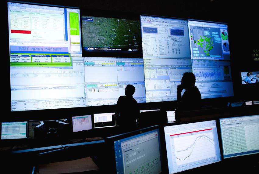 Reliability Coordinators monitored the state power grid during a tour of the Electric Reliability Council of Texas (ERCOT) command center in Taylor in 2012.