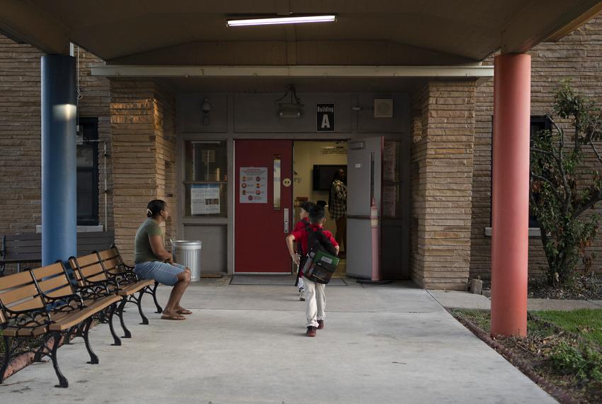 Celina Manzano's children head to school at Pugh Elementary School in East Houston on October 2, 2023.