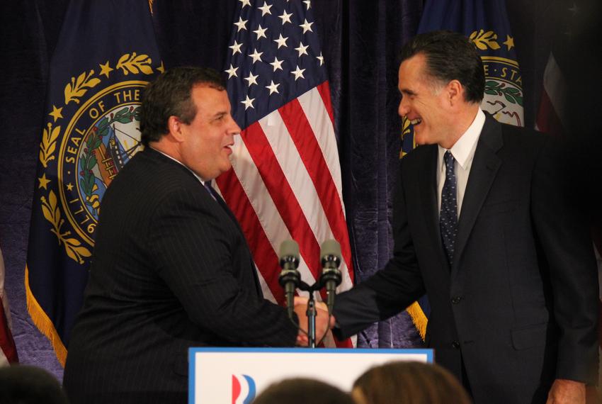 Mitt Romney and Gov. Chris Christie shake hands after Romney introduces him at event in Lebanon, N.H.