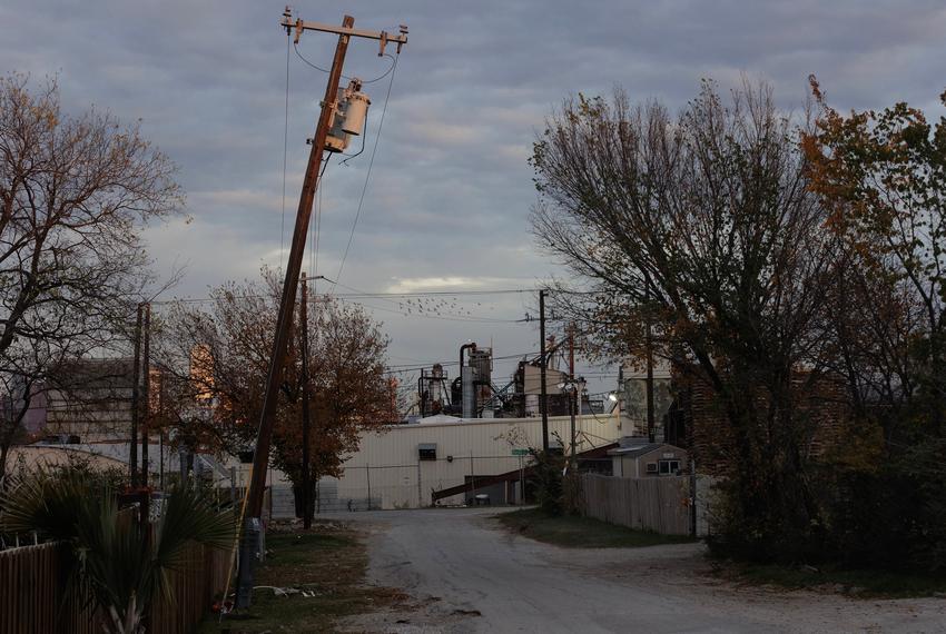 The GAF roofing shingles factory can be seen from neighborhoods situated next-door in West Dallas on Dec. 13, 2023.
