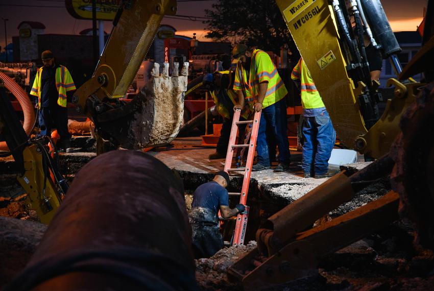 City of Odessa Water Distribution employees work through the night as they attempt to repair a broken water main Tuesday, June 14, 2022 in Odessa. According to Mayor of Odessa Javier Joven, repairs were completed around 3:45 a.m. Wednesday.