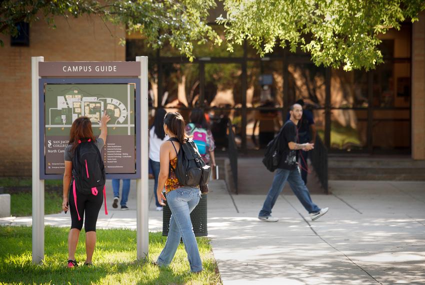 Students head to class on the second day of the semester at San Jacinto College's North Campus in Houston on Aug. 26, 2014.  