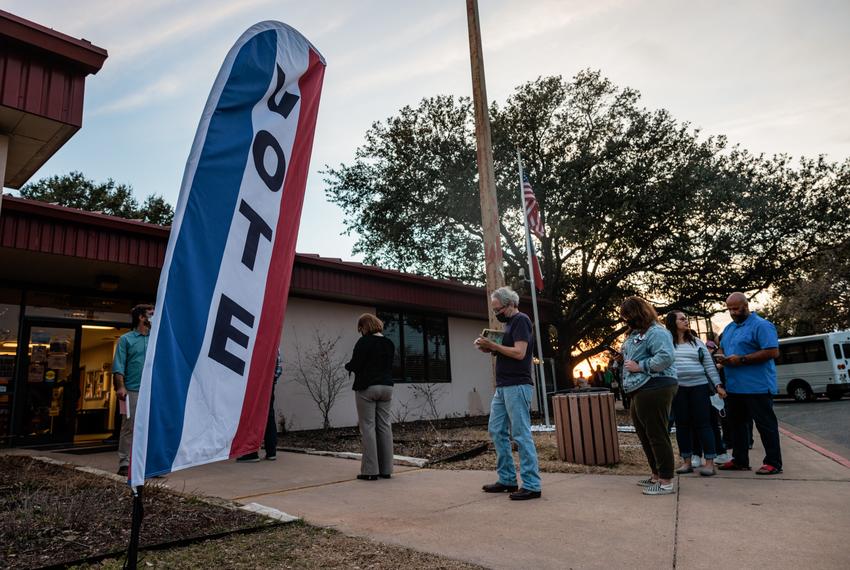 Voters wait to cast their ballots at the Dittmar Recreation Center in South Austin on March 1, 2022.