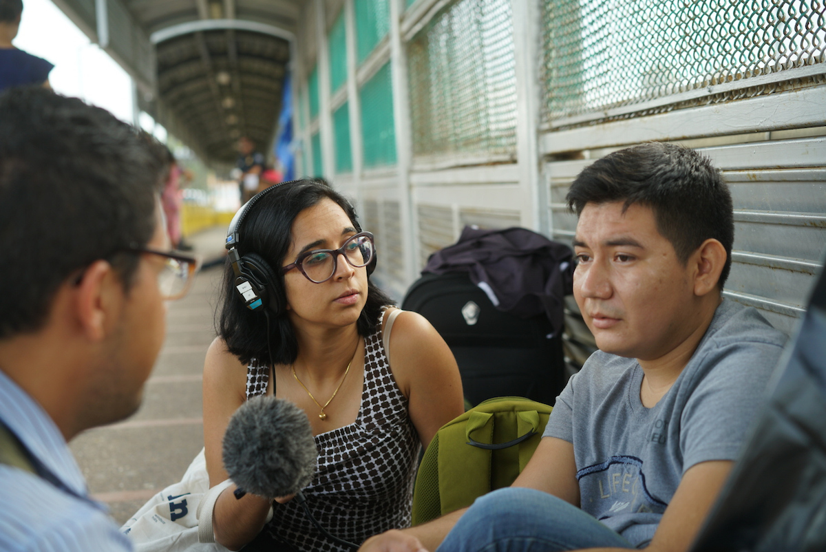 Investigative reporter Neena Satija interviews a Guatemalan migrant whose wife and four children were separated at the Texas-Mexico border.
